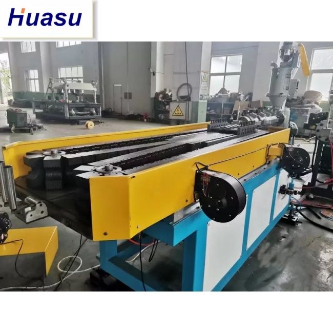 उच्च उत्पादकता DWC पाइप एक्सट्रूज़न लाइन 32-1600 मिमी काटने व्यास रेंज और सीमेंस पीएलसी प्रौद्योगिकी के साथ